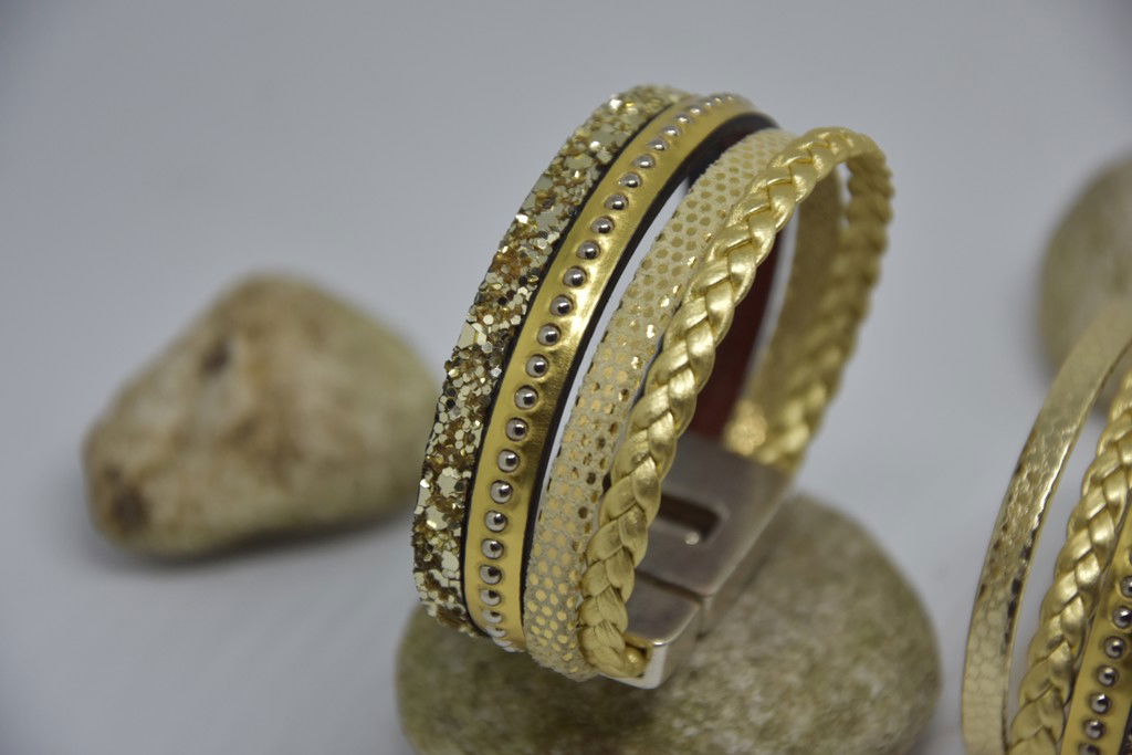 N°7 Lederen Armband Goud Gevlochten